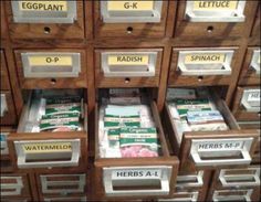 the drawers are labeled with different types of herbs