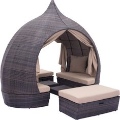 an outdoor furniture set is shown with a canopy and cushions on the outside, along with a footstool