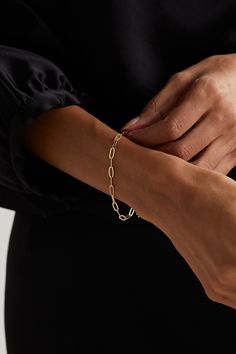 Mateo's bracelet is designed in a simple shape that looks great on its own or stacked with other minimal styles. It's hand-cast from polished 14-karat gold with sleek paperclip chain-links and feels really lightweight. Classic White Gold Paperclip Bracelet For Everyday, Modern Gold Bracelet With Box Chain, Modern Oval Link Bracelet For Everyday Luxury, Modern Gold Bracelet, Tarnish Resistant For Everyday Luxury, Luxury 14k Gold Tarnish-resistant Paperclip Bracelet, Elegant Sterling Silver Tarnish-resistant Oval Link Bracelet, Modern Tarnish-resistant Gold Bracelet For Everyday Luxury, Modern Tarnish-resistant Oval Link Bracelets, Modern Tarnish-resistant Oval Link Bracelet