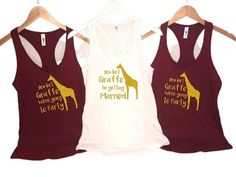 two women's tank tops with giraffes printed on the front and back