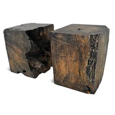 two pieces of wood sitting next to each other