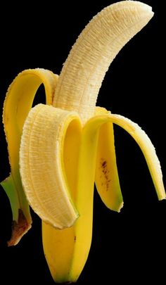 a ripe banana is hanging upside down on a black background with the peel still attached