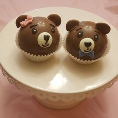 two cupcakes shaped like bears on a plate