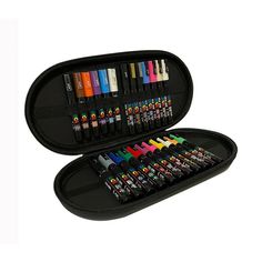 an open black case filled with different colored crayons