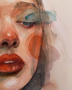 a watercolor painting of a woman's face with blue eyes and orange lips