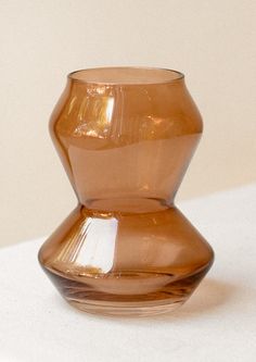 A glass vase in transparent amber hue with tapered conical shape. Home Decor Vases, Vases Decor, Accent Decor, Glass Vase, Vase, Glass