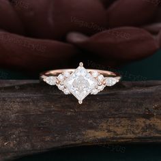 an engagement ring with two pear shaped diamonds