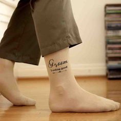 a person with a tattoo on their foot