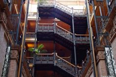 the inside of a building with many balconies