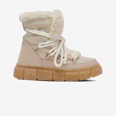 GREATS - The Madison Boot - Sand - Women's Shoe Casual Boots With Faux Fur Trim In Shearling, Beige Insulated Winter Boots, Casual Shearling Boots With Faux Fur Trim, Casual Boots With Faux Fur Trim And Shearling, Casual Boots With Faux Fur Trim, Beige Sheepskin Boots For Winter, Beige Sheepskin Winter Boots, Winter Shearling Boots With Lug Sole, Chic Winter Boots With Faux Fur Trim