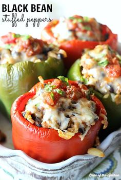 stuffed bell peppers in a white dish on a blue and white cloth with text overlay