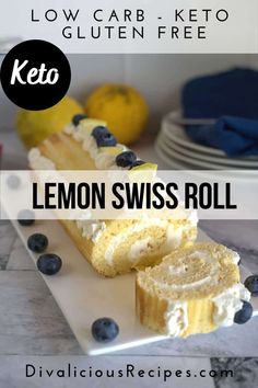 lemon swiss roll on a white plate with blueberries and lemons in the background