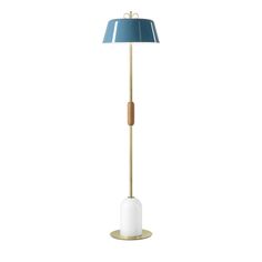 a floor lamp with a blue shade on it