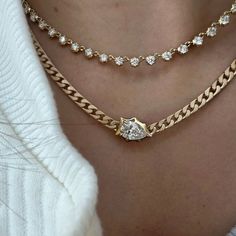 A new addition to our chain & diamond necklace family, the one-of-a-kind Envoy Curb Chain Necklace is an edgy and feminine necklace that is sure to amp up any neck stack. Handcrafted in 18-karat yellow gold and featuring a 1.51ct H / SI2 pear-shaped diamond in an east-west setting on our signature satin-finished Stevie Chain. Handcrafted in 18-Karat Yellow Gold Solid 14 - 16 Inch Stevie Gold Chain White Diamonds: 1.32ct H/SI2 Pear-Shaped Diamond Removable 2-inch Chain Extender Included Made in New York City Neck Stack, Necklace Family, Feminine Necklace, Chain Diamond, Curb Chain Necklace, Gem Necklace, Chain Extenders, Evil Eye Necklace, Pear Shaped Diamond