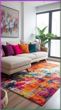 a living room filled with lots of furniture and colorful pillows on top of a rug