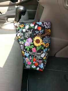 the back seat of a car with flowers and words all over it's trim