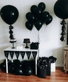 black and white party decorations with balloons