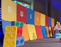 children's play area with large blocks and giant legos on the floor at an indoor event