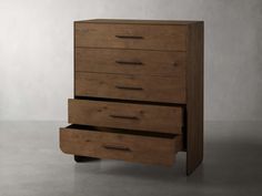 a wooden dresser sitting on top of a cement floor