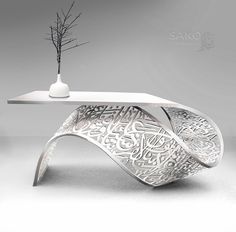 a white table with an intricate design on it