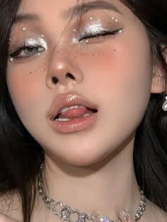 glitter eyeshadow look: metallic silver with gems Prom Makeup Looks Rhinestones, Asian Fairy Makeup, Silver Eye Makeup Look, Pearly Makeup Look, Makeup With Beads, Mermaid Pearl Makeup, Moon Makeup Aesthetic, White Pearl Makeup, Ateez Inspired Makeup