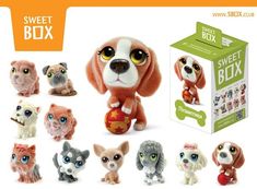 there are many small toy dogs in the box and one has a dog on it