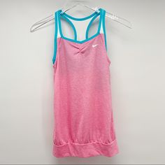 * Nwt Nike Girls Pink Tank Size Large *Features A Loose Fitting Pink Tank With Built In Blue Bra *5c82620eswtrmn Playful Nike Tops For Sports, Pink Cotton Workout Top, Pink Cotton Top For Workout, Pink Tank Top For Spring Playwear, Playful Blue Nike Tops, Cute Nike Summer Tops, Cute Nike Tops For Summer, Nike Sporty Tops For Playwear, Nike Casual Pink Tank Top