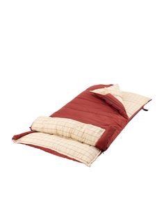 a red and white sleeping bag on a white background