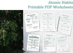 the printable worksheet for atomic habitts is displayed next to some plants