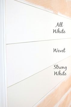 the wall is painted white and has writing on it that says all white, weveet, strongwhite