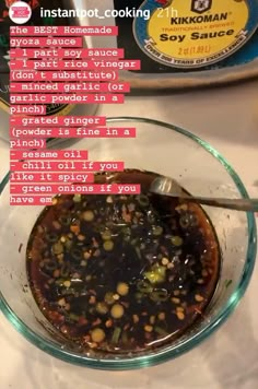 a bowl filled with food sitting on top of a table