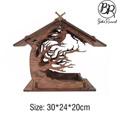 a wooden clock with a tree on it