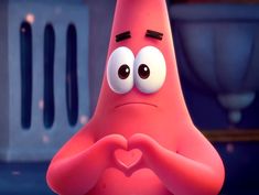 a pink cartoon character making a heart with his hands and looking at the camera while standing in front of a radiator