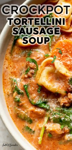 a close up of a bowl of food with bread on the side and text overlay reading crockpot tortelli sausage soup