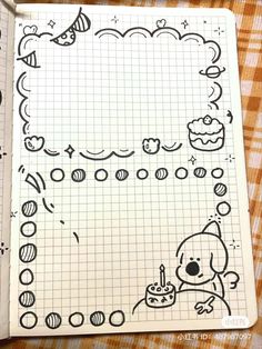 an open notebook with doodles on it and a drawing of a dog holding a birthday cake