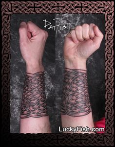 two hands with tattoos on each arm and one hand in the middle, both holding up their fists