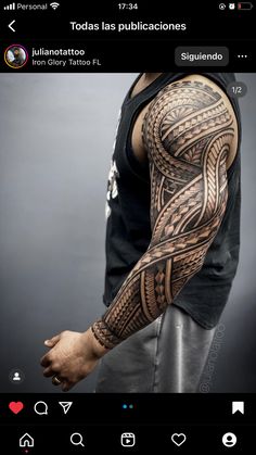 a man with a tattoo on his arm