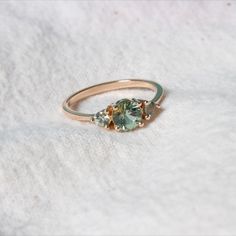 Dainty rose gold engagement ring with a trio of pale green sapphires Sage Green Rings, Sage Green Wedding Rings, Sage Green Ring, Green Wedding Rings, Lotr Wedding, Y2k Rings