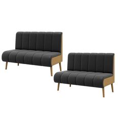 two black couches sitting next to each other