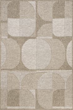 an area rug with circles and squares on the side, in neutral colors is shown