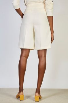 - Measurements: 1. Waist: 36cm, 2. Front rise: 35cm, 3. Length: 56.5cm- Materials: 80% polyester, 20% rayon- Thickness: Moderate- Sheerness: None- Stretch: None- Lining: Partial- Care: Dry clean or hand wash cold and dry flat in shade Chic White Knee-length Shorts, Tailored Elegant Shorts, Elegant Tailored Shorts, Tailored Formal Shorts, Elegant Wide Leg Beige Shorts, Elegant Knee-length Bermuda Shorts For Spring, White Short Leg Bottoms For Workwear, White Wide Leg Workwear Shorts, White Wide Leg Shorts For Work