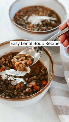 two bowls filled with lentil soup on top of a table