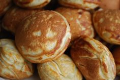 some breads that are sitting on a plate