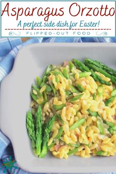 pasta with asparagus and other vegetables in a white bowl on a blue towel