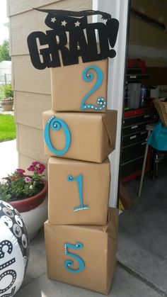 cardboard boxes are stacked on top of each other in the shape of numbers and stars