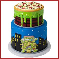 three tiered cake decorated with cartoon characters on it's sides and topped with green icing