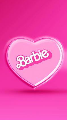 a pink heart with the word barbie on it