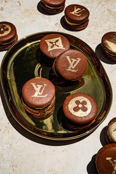 Food Photography photo of Louis Vuitton French Macarons on a gold plate. Filipino Food Recipes, Designer Aesthetic, Fashion Jobs, French Macaron, Dinner Event, Luxury Food, Pricing Guide