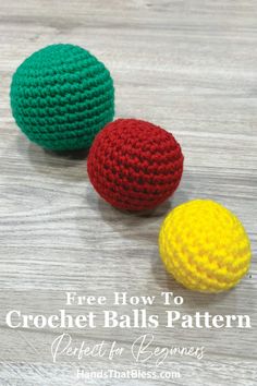 three crochet balls sitting on top of a wooden table next to each other