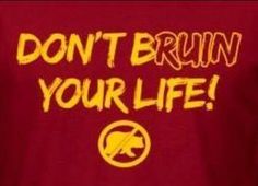 the words don't braun your life are written in yellow on a red shirt